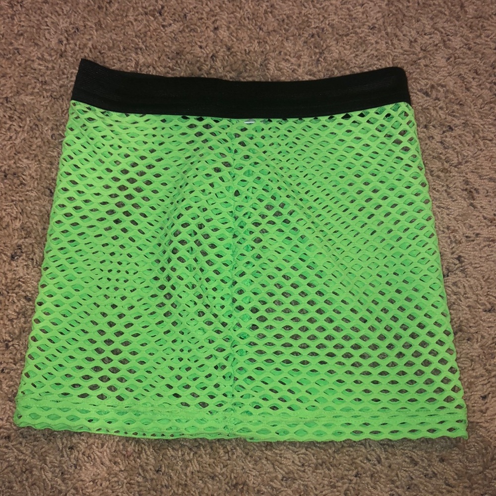 I Heart Raves two piece fishnet skirt and top.
